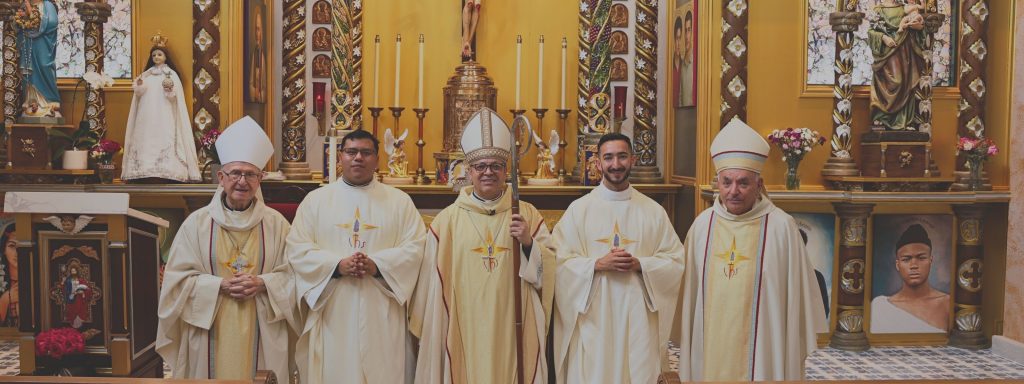 Fr. Luis Angeles and Fr. Larry Curtis with Bishops Rojas, Rutilio, and Barnes